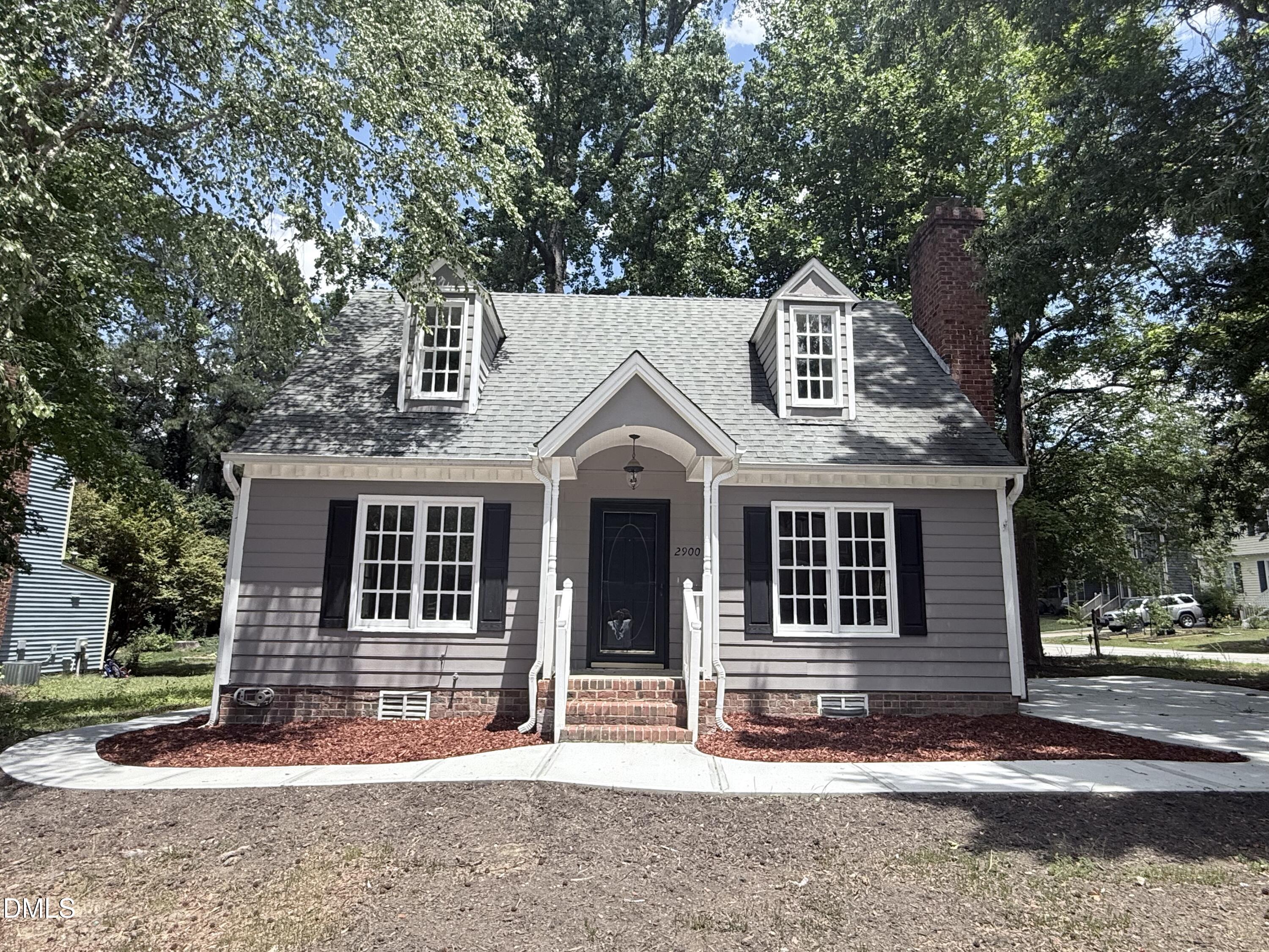 2900 Broadlands Drive Raleigh, NC 27604 - Photo 60 of 60 a view of a house with a yard and large tree