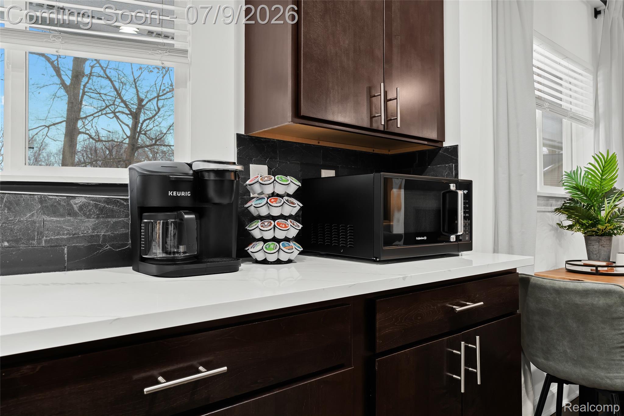 2566 Harrington Road Rochester, MI 48307 - Photo 15 of 64 Kitchen featuring coffee maker with coffee and microwave