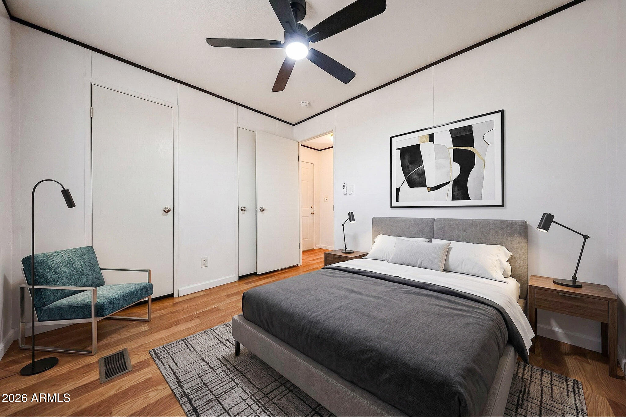 201 South Greenfield Road, Unit 254 Mesa, AZ 85206 - Photo 13 of 35 a bedroom with a bed dresser and a window