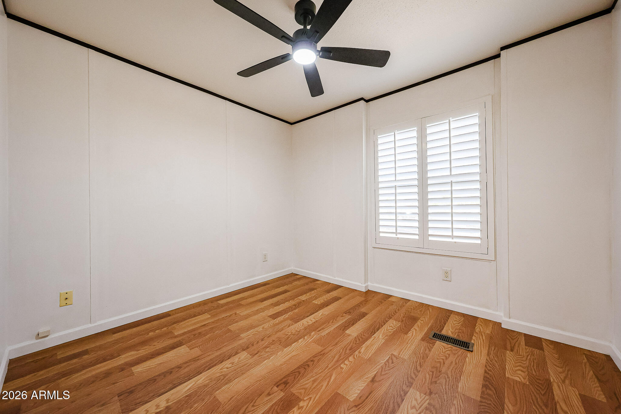 201 South Greenfield Road, Unit 254 Mesa, AZ 85206 - Photo 14 of 35 a view of a room with a window and a ceiling fan