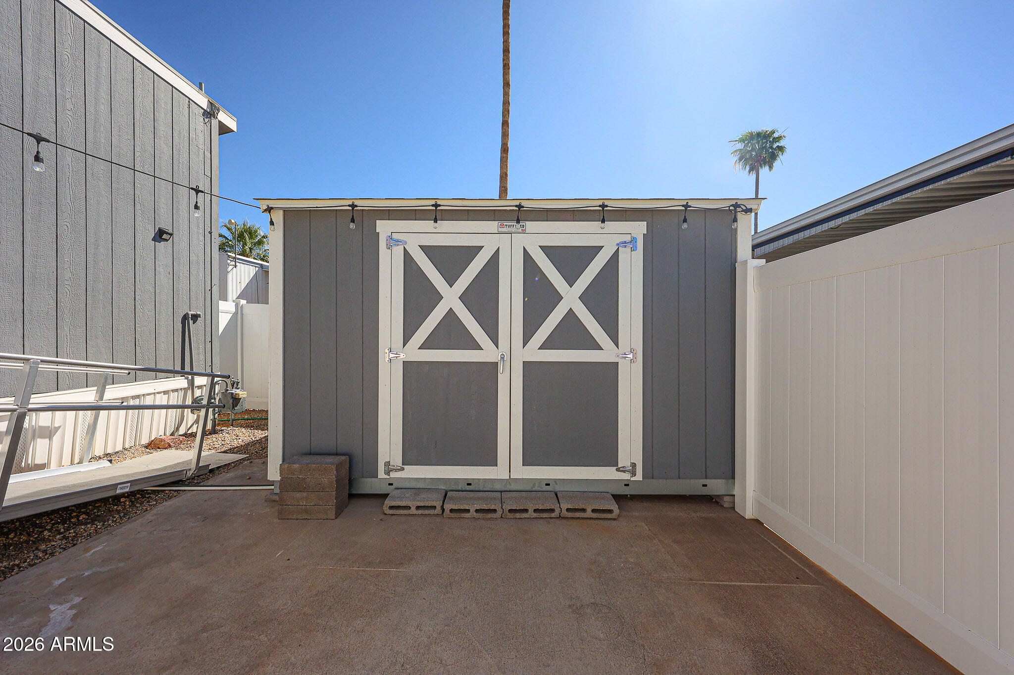 201 South Greenfield Road, Unit 254 Mesa, AZ 85206 - Photo 16 of 35 a front view of a house with a garage