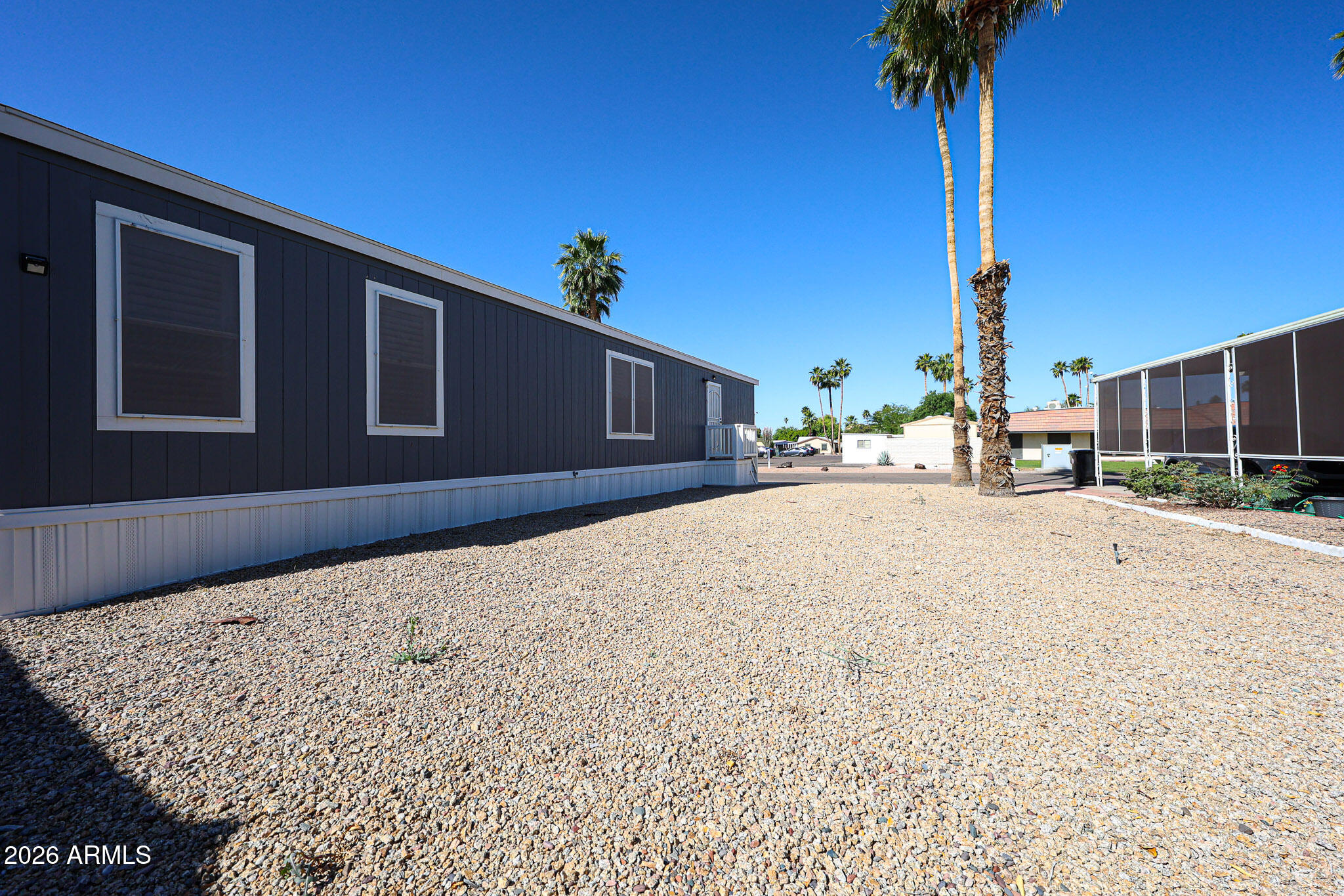 201 South Greenfield Road, Unit 254 Mesa, AZ 85206 - Photo 18 of 35 a house view with a backyard space