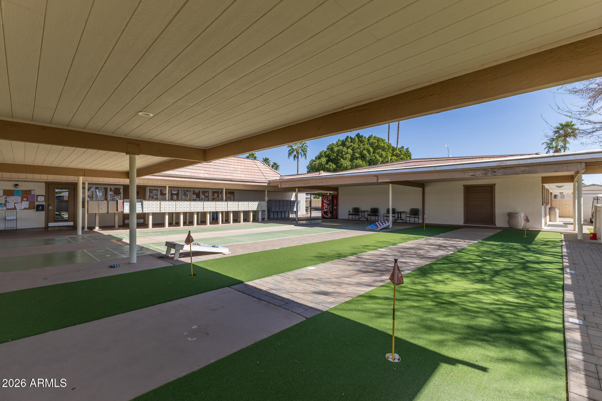 201 South Greenfield Road, Unit 254 Mesa, AZ 85206 - Photo 27 of 35 a front view of a house with a yard