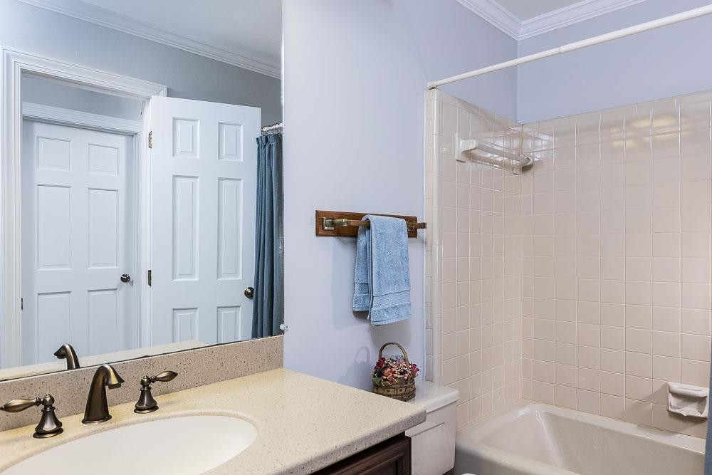 9513 Springdale Drive Raleigh, NC 27613 - Photo 22 of 30 Hall Bathroom