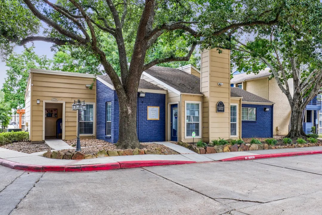1100 Graham Drive, Unit 1602 Tomball, TX 77375 - Photo 13 of 27 a front view of house with yard and tree