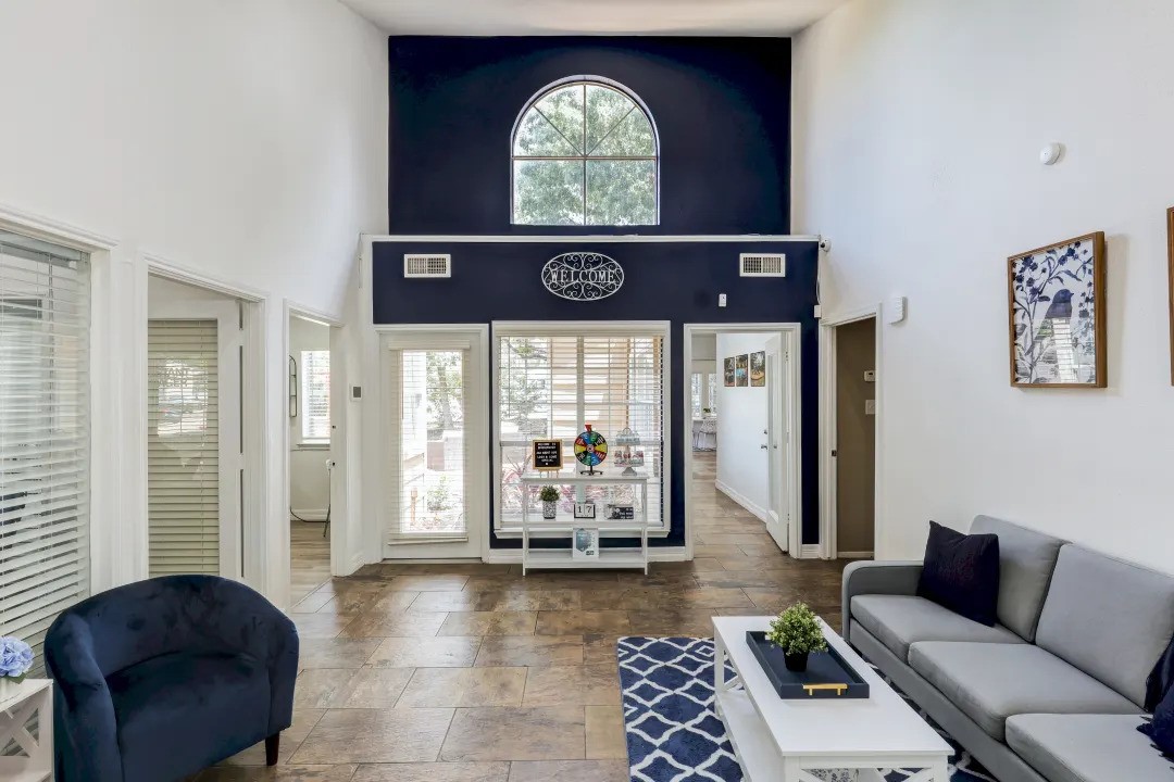 1100 Graham Drive, Unit 1602 Tomball, TX 77375 - Photo 14 of 27 a living room with furniture and a large window