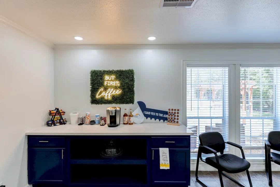 1100 Graham Drive, Unit 1602 Tomball, TX 77375 - Photo 16 of 27 a living room with furniture and a flat screen tv