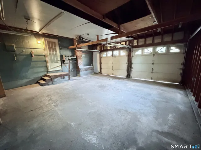a view of a empty room with gym equipment