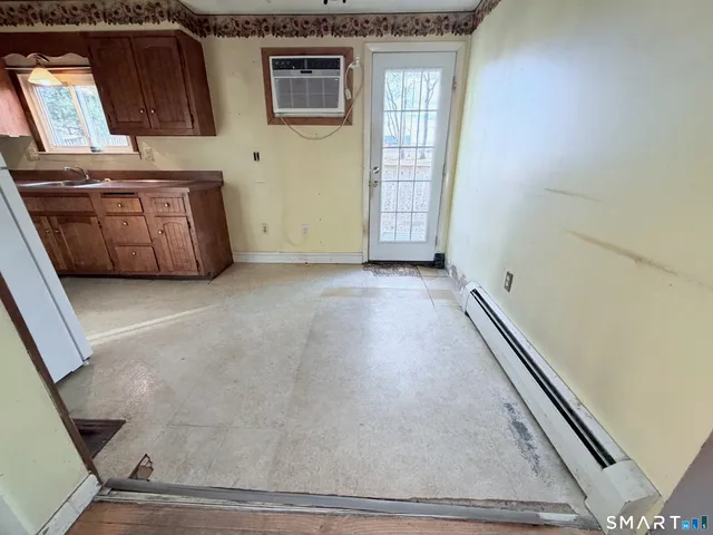 an empty room with windows