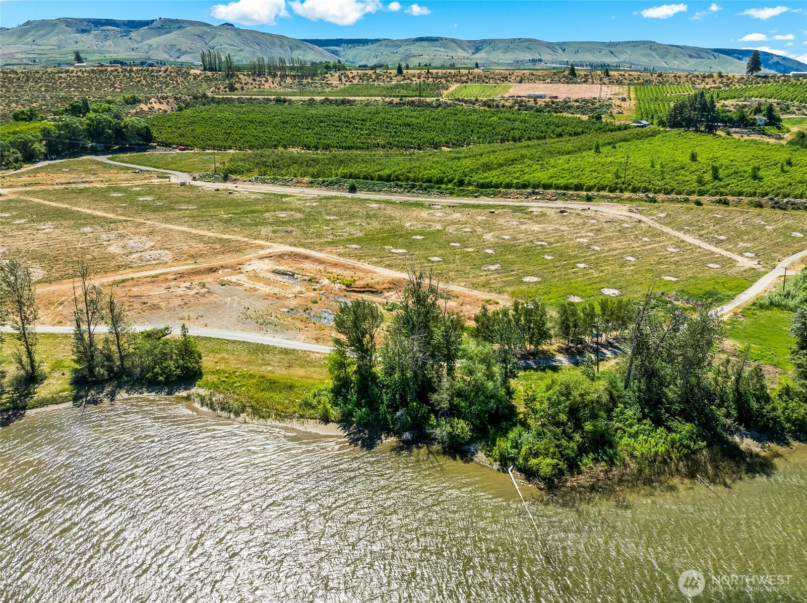 0 Lot 3 Silvest Road Orondo, WA 98843 - Photo 12 of 20 a view of a field with an ocean