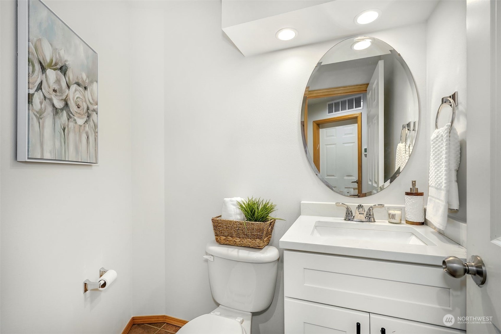 2010 Magnolia Road Lynnwood, WA 98036 - Photo 11 of 22 a bathroom with a toilet a sink and mirror