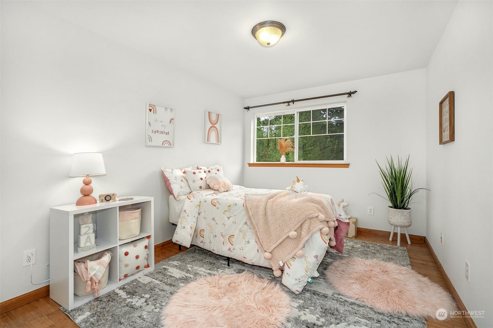 2010 Magnolia Road Lynnwood, WA 98036 - Photo 18 of 22 a spacious bedroom with a bed and a window