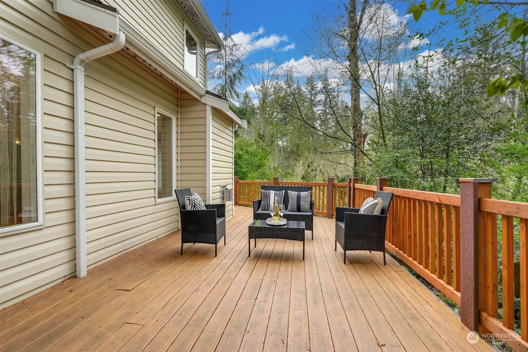 2010 Magnolia Road Lynnwood, WA 98036 - Photo 22 of 22 a view of a wooden deck with furniture