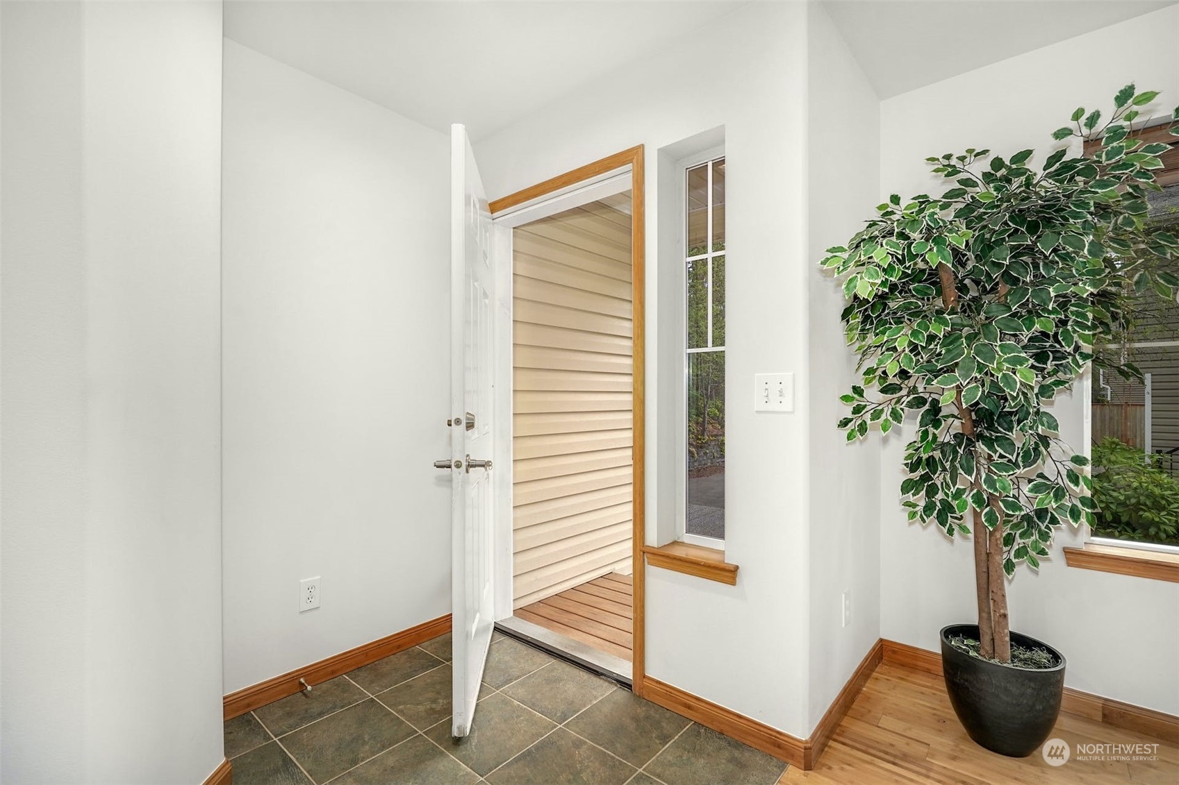 2010 Magnolia Road Lynnwood, WA 98036 - Photo 3 of 22 a view of entryway with table and potted plant