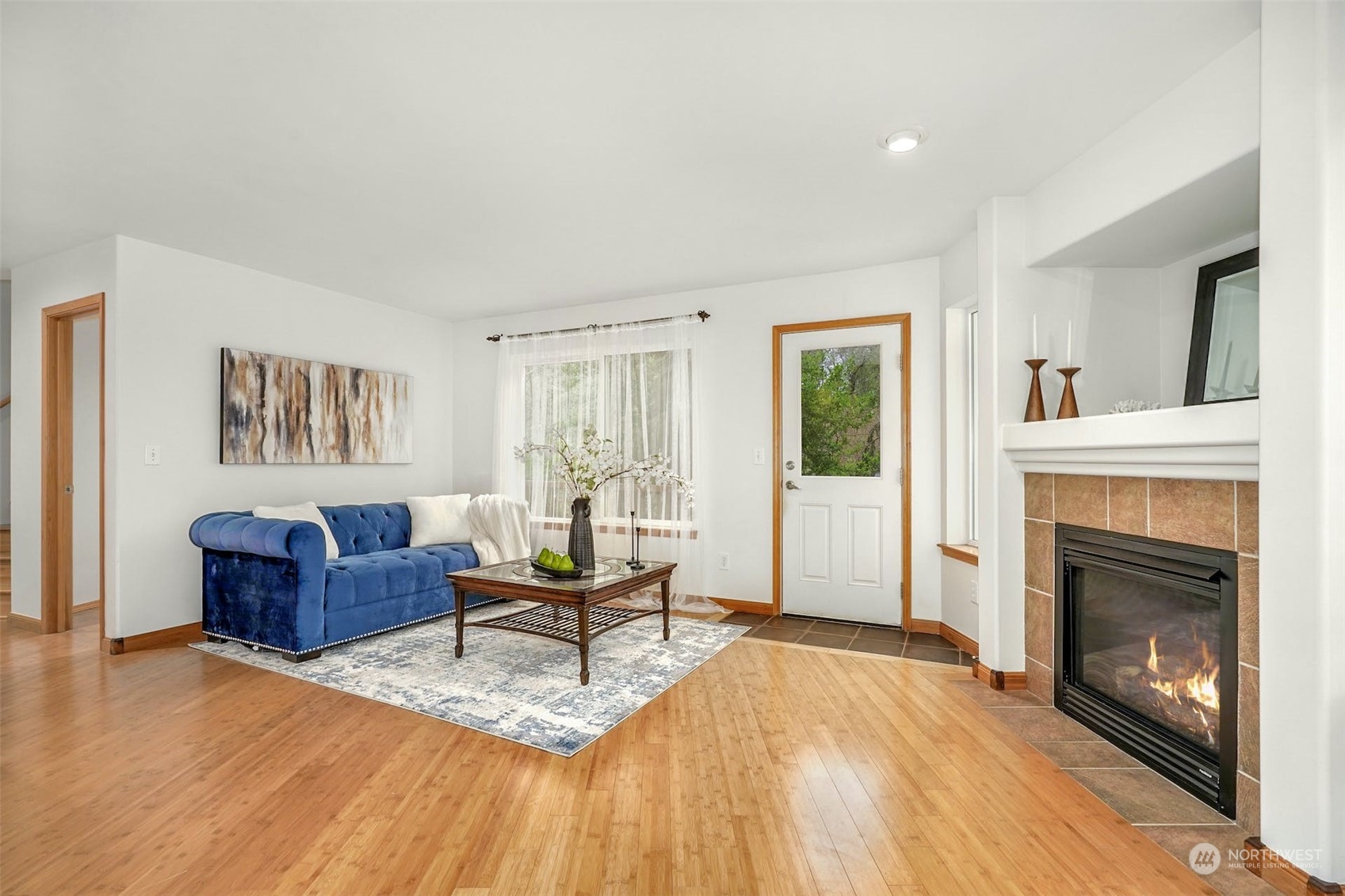 2010 Magnolia Road Lynnwood, WA 98036 - Photo 6 of 22 a living room with furniture and a fireplace