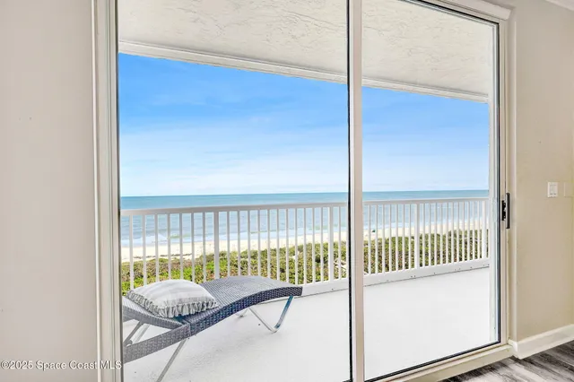 a view of ocean from a balcony
