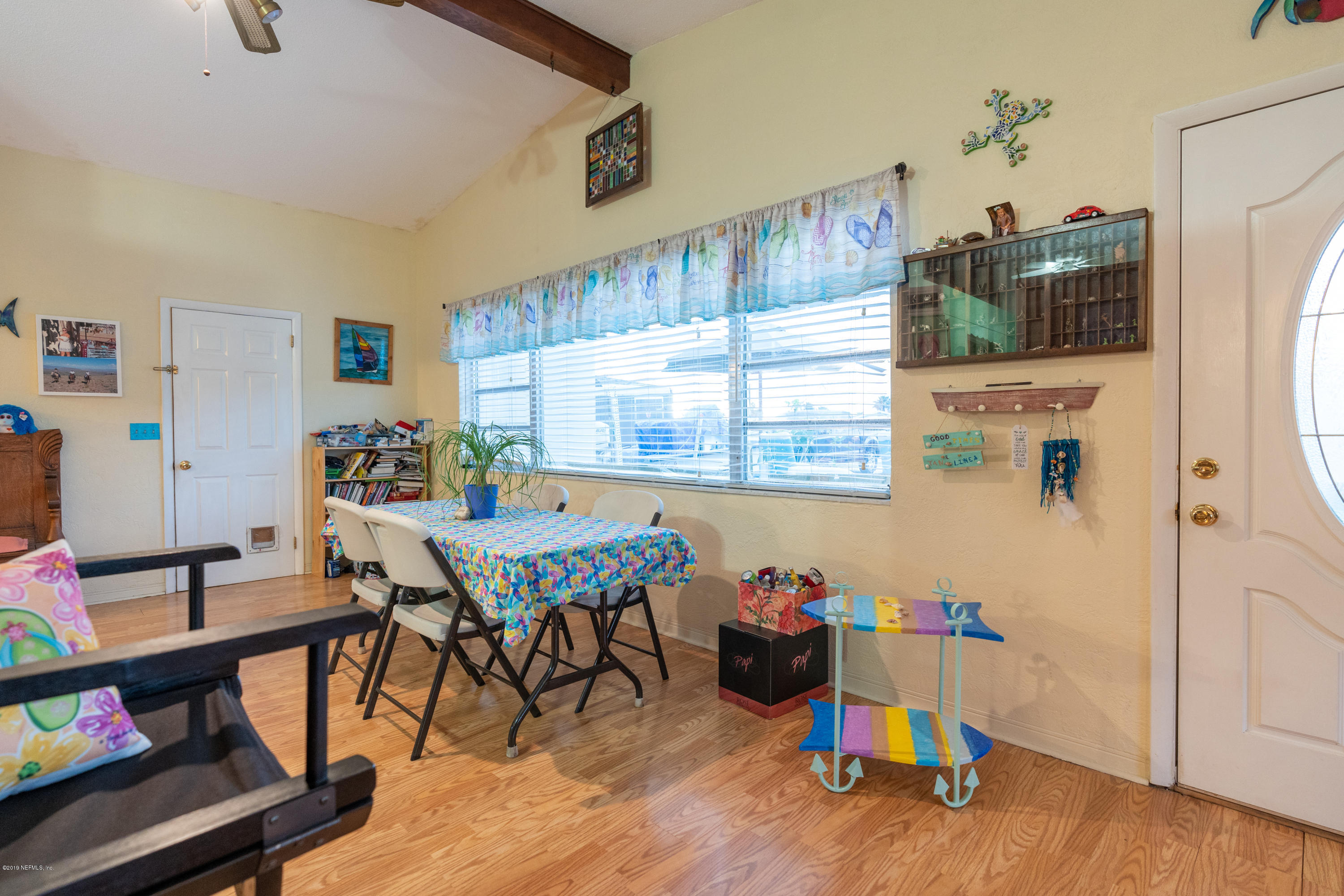 34 Ocean Drive St. Augustine, FL 32080 - Photo 13 of 36 a room with furniture and a wooden floor