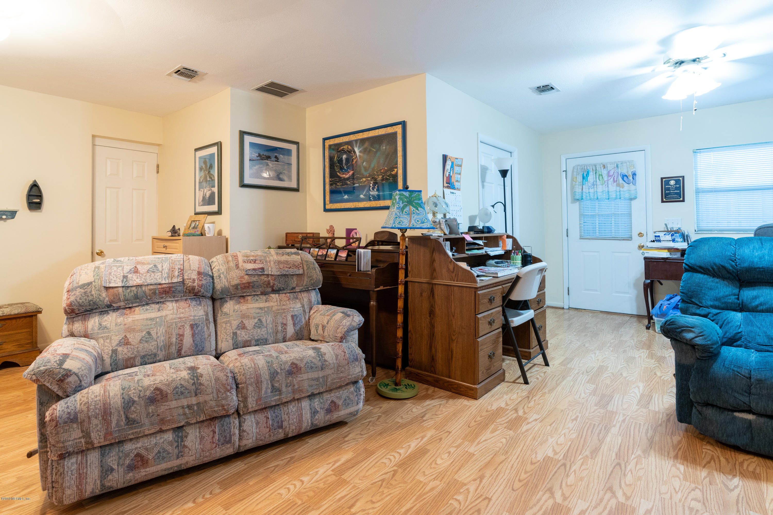 34 Ocean Drive St. Augustine, FL 32080 - Photo 14 of 36 a living room with furniture and wooden floor