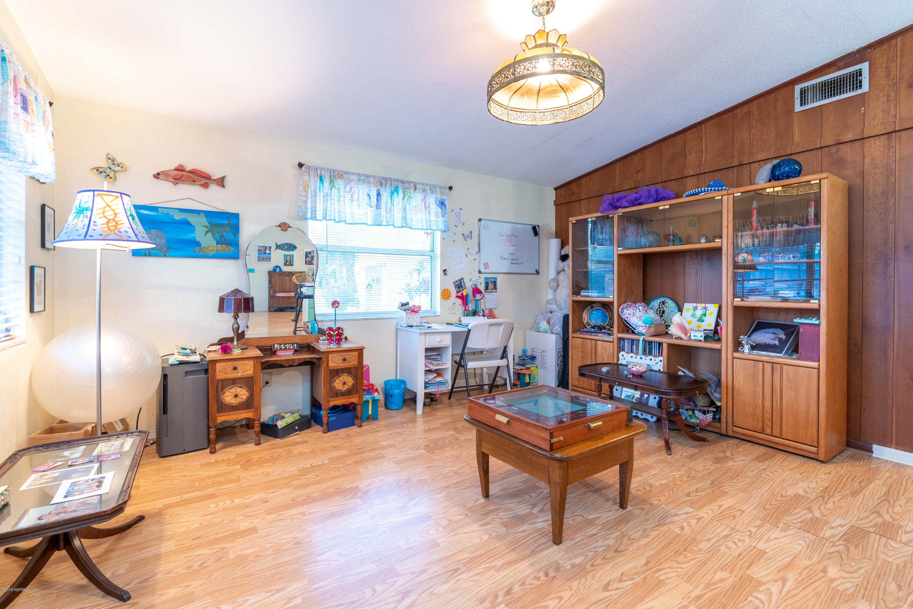 34 Ocean Drive St. Augustine, FL 32080 - Photo 15 of 36 a living room with furniture and a kitchen area