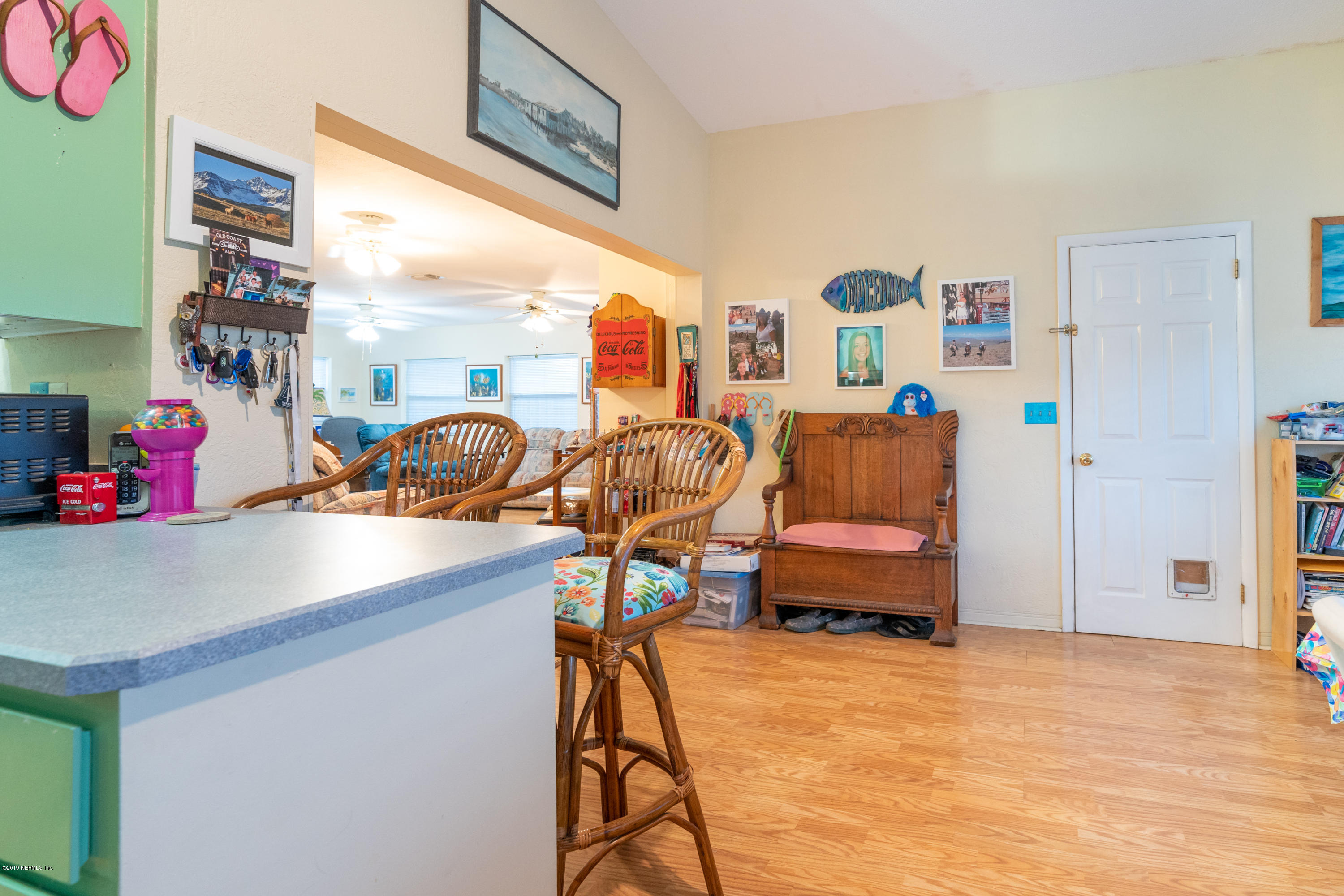 34 Ocean Drive St. Augustine, FL 32080 - Photo 16 of 36 a bedroom with furniture and a large window