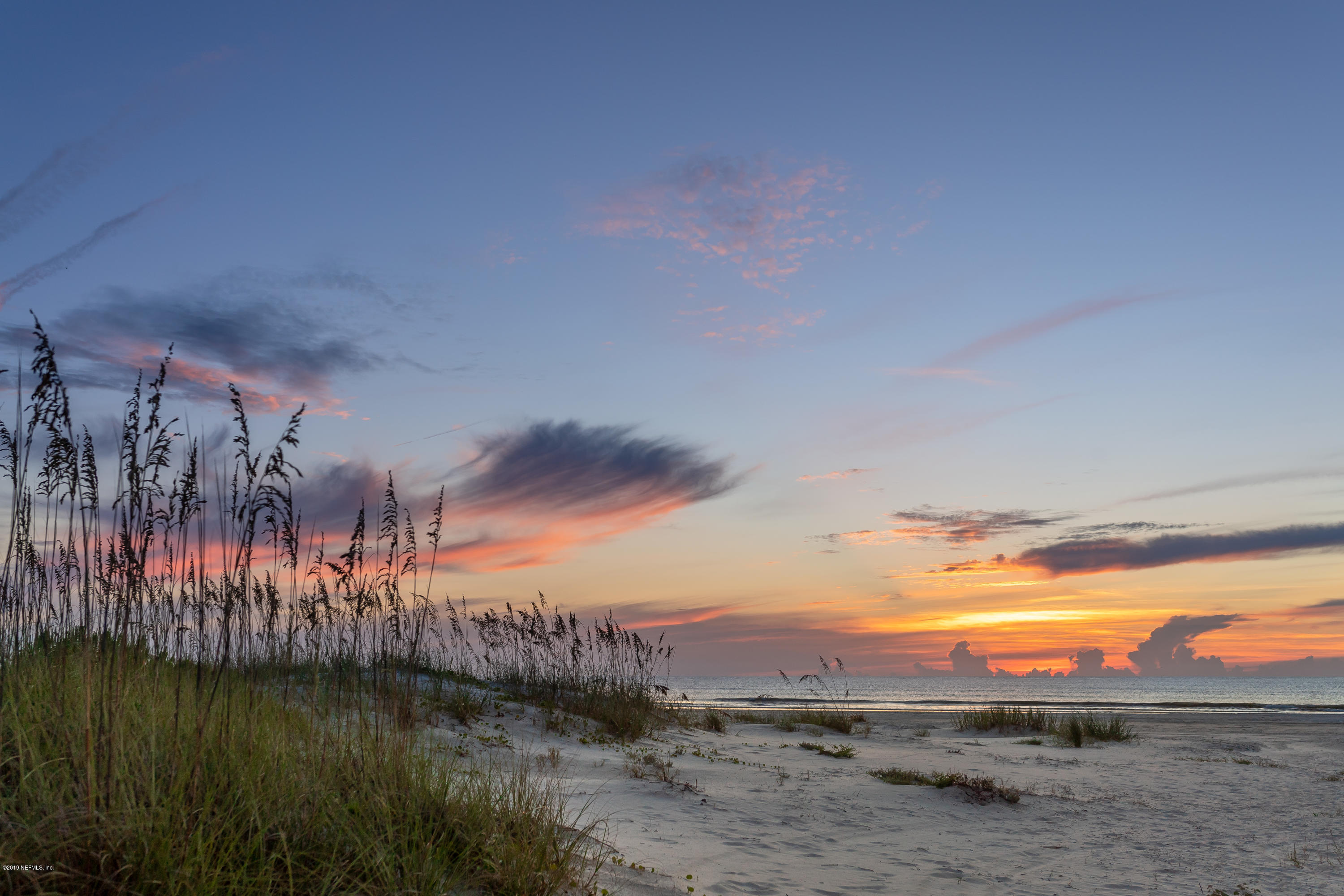 34 Ocean Drive St. Augustine, FL 32080 - Photo 4 of 36 a view of a lake with a mountain in the background