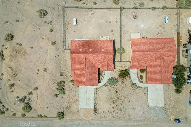 view of a bathroom with a shower and a mirror