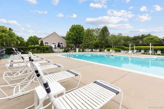 a view of swimming pool from a yard