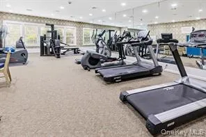 a view of a living room and dining room