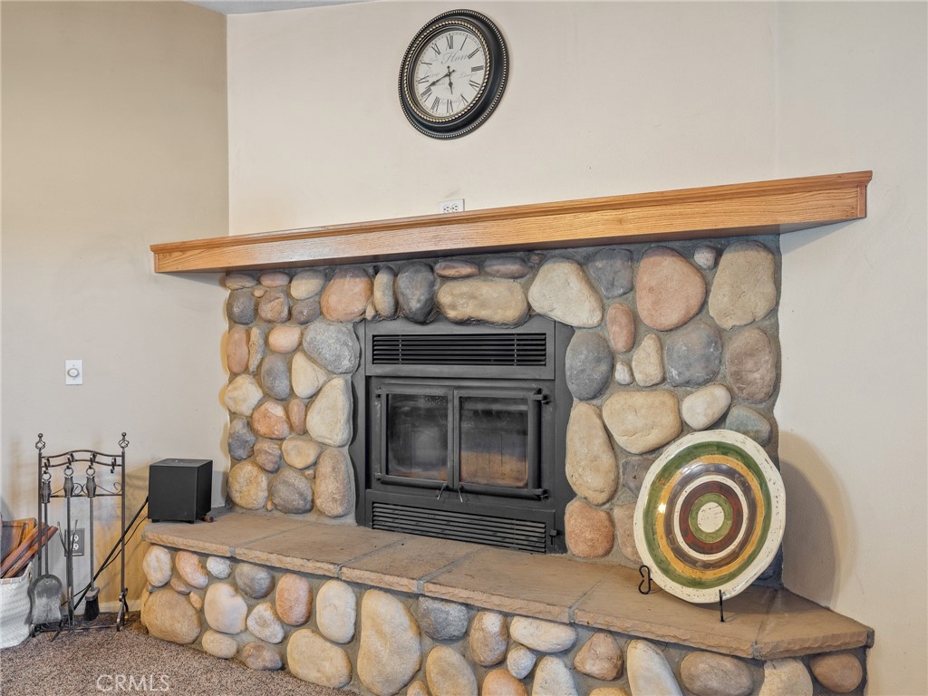 13776 Natoma Road Apple Valley, CA 92307 - Photo 13 of 40 a view of washer and dryer with kitchen in the background