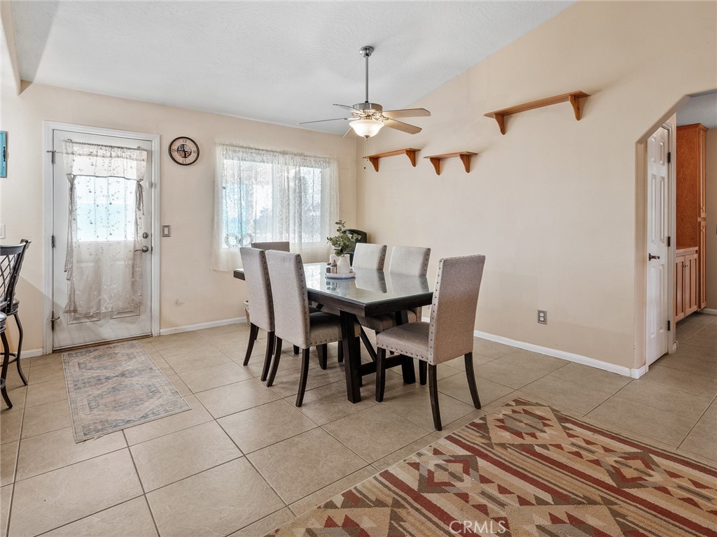 13776 Natoma Road Apple Valley, CA 92307 - Photo 16 of 40 a view of a dining room with furniture