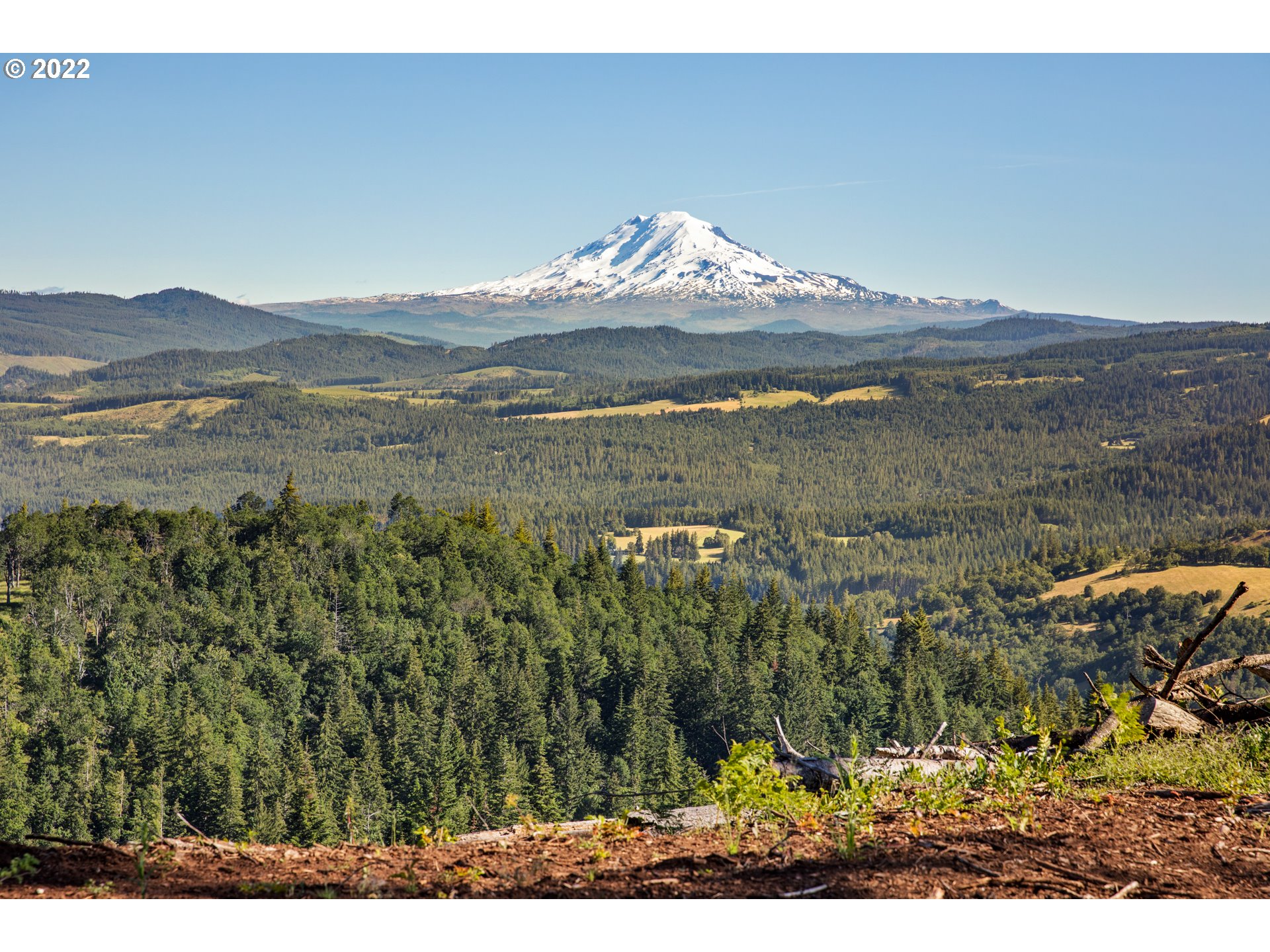 a view of a sky from the mountains