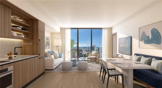 a living room with furniture and a large window