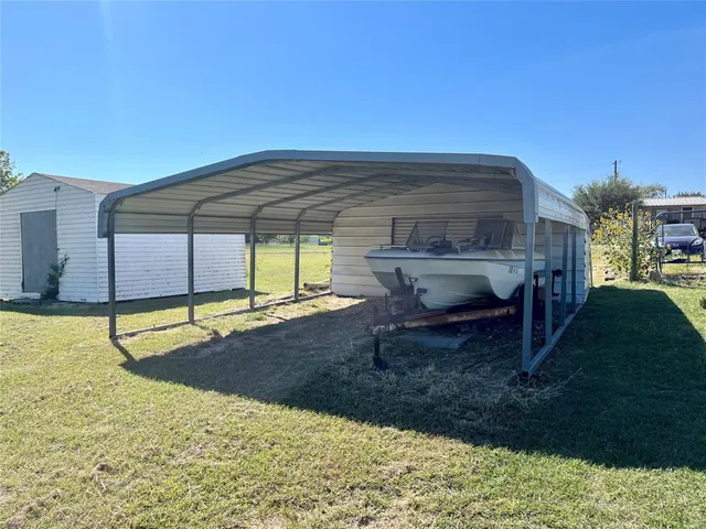 a house view with a backyard space