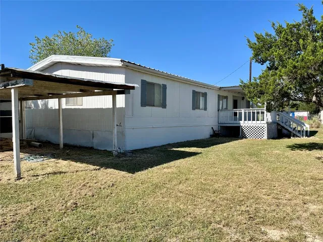 a view of a house with a snow