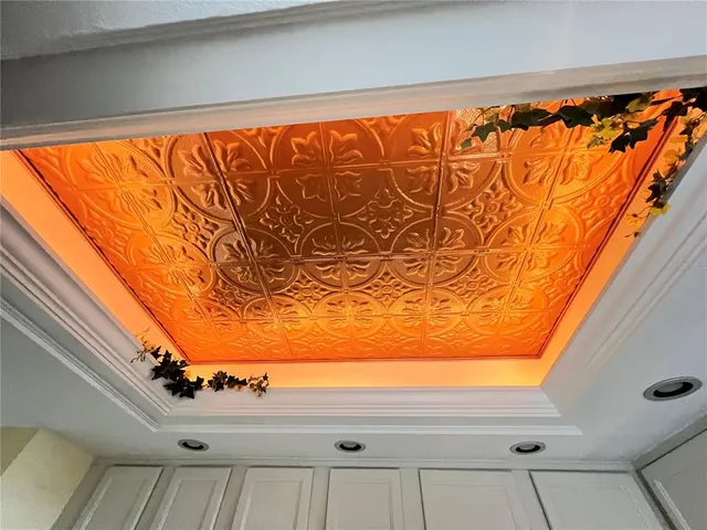 a bedroom with a large bed and a large window