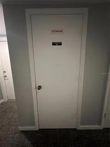 a view of a street with a building in the background