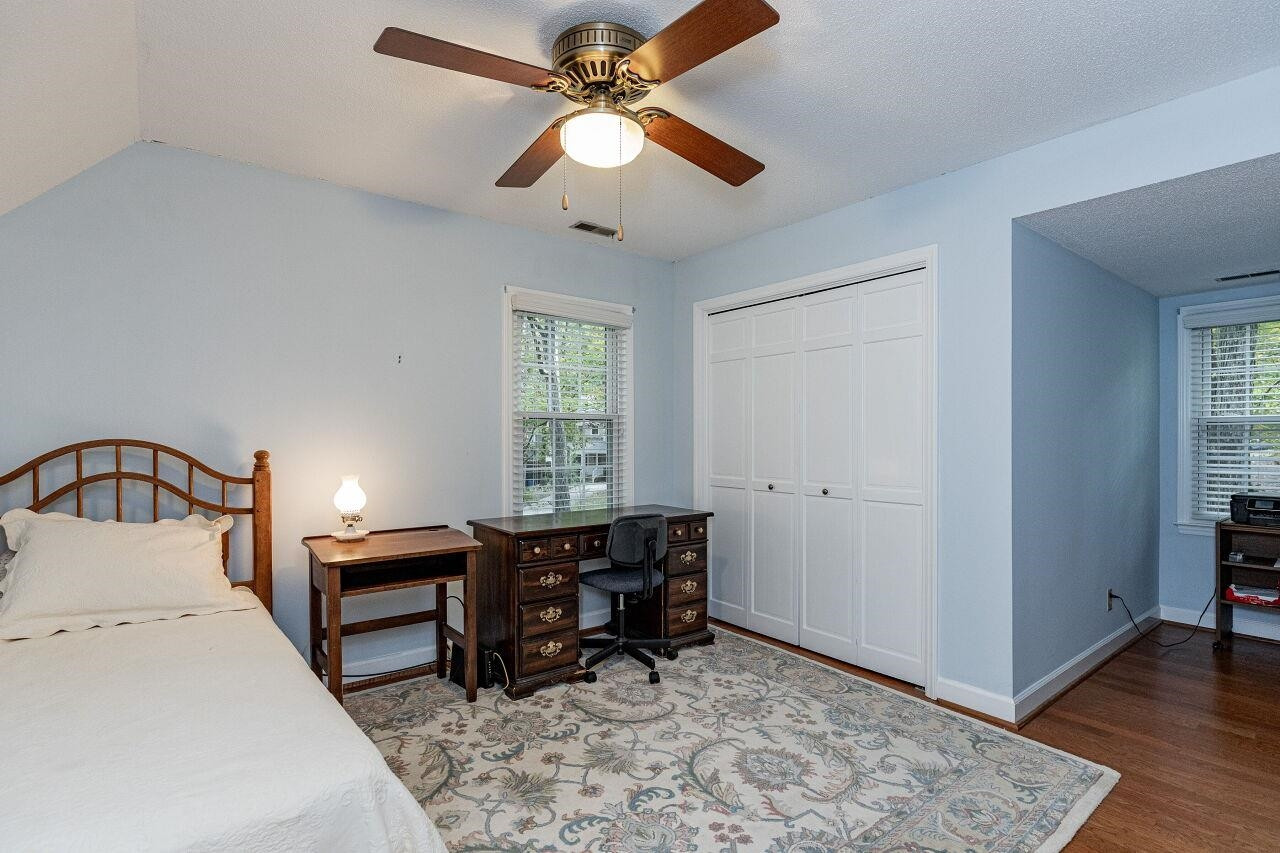 7811 Breckon Way Raleigh, NC 27615 - Photo 25 of 30 Hardwood flooring. Abundant walk-in storage with shelving. Third Bedroom