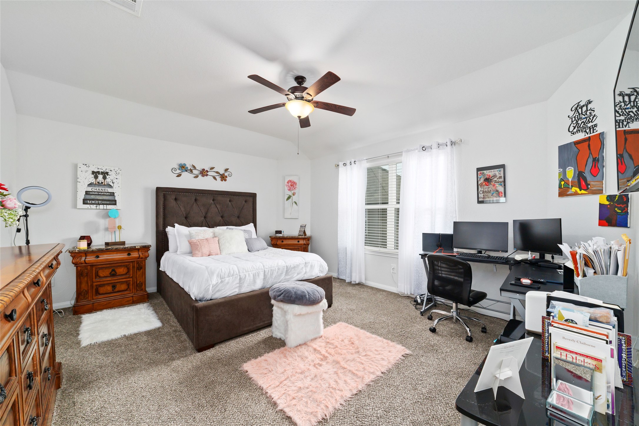 18619 Cooper Ravine Way Katy, TX 77449 - Photo 14 of 23 a bedroom with a bed a couch and a window