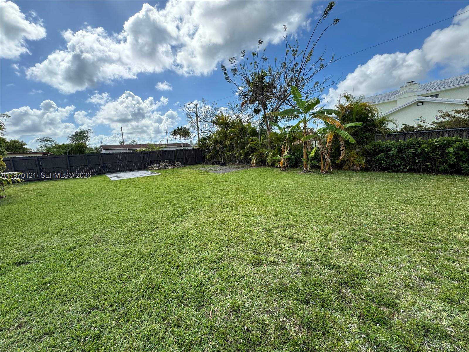 8400 Southwest 46th Street Miami, FL 33155 - Photo 4 of 12 a view of a garden with a building