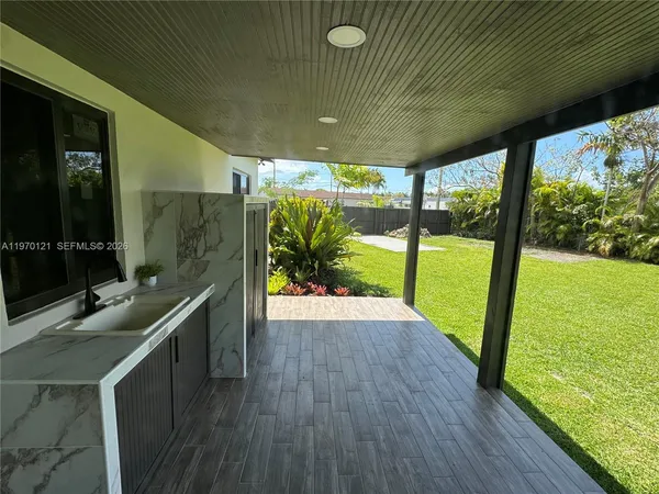 a view of swimming pool from a balcony