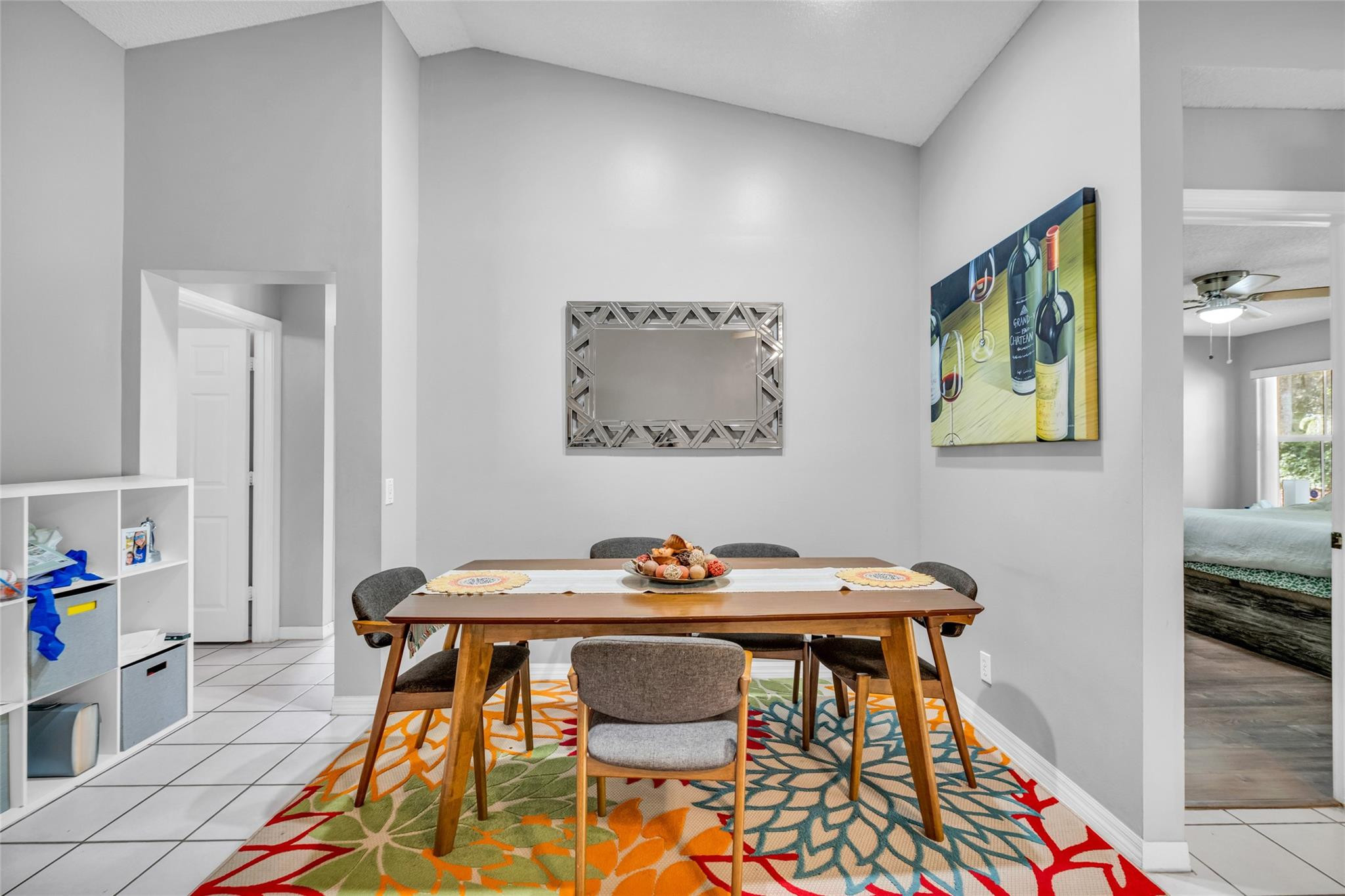 1665 Zenith Way Weston, FL 33327 - Photo 16 of 22 a dining room with table and chair