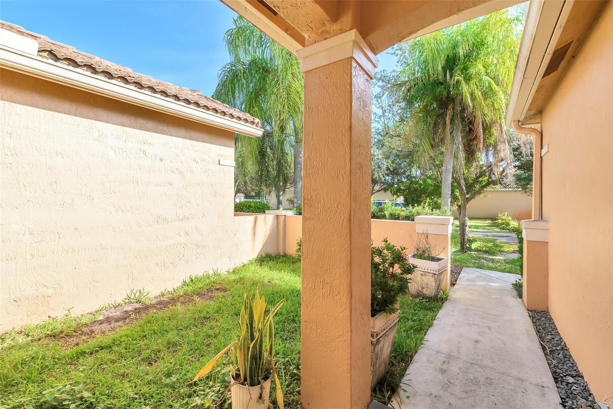 1665 Zenith Way Weston, FL 33327 - Photo 20 of 22 a view of a back yard from a balcony