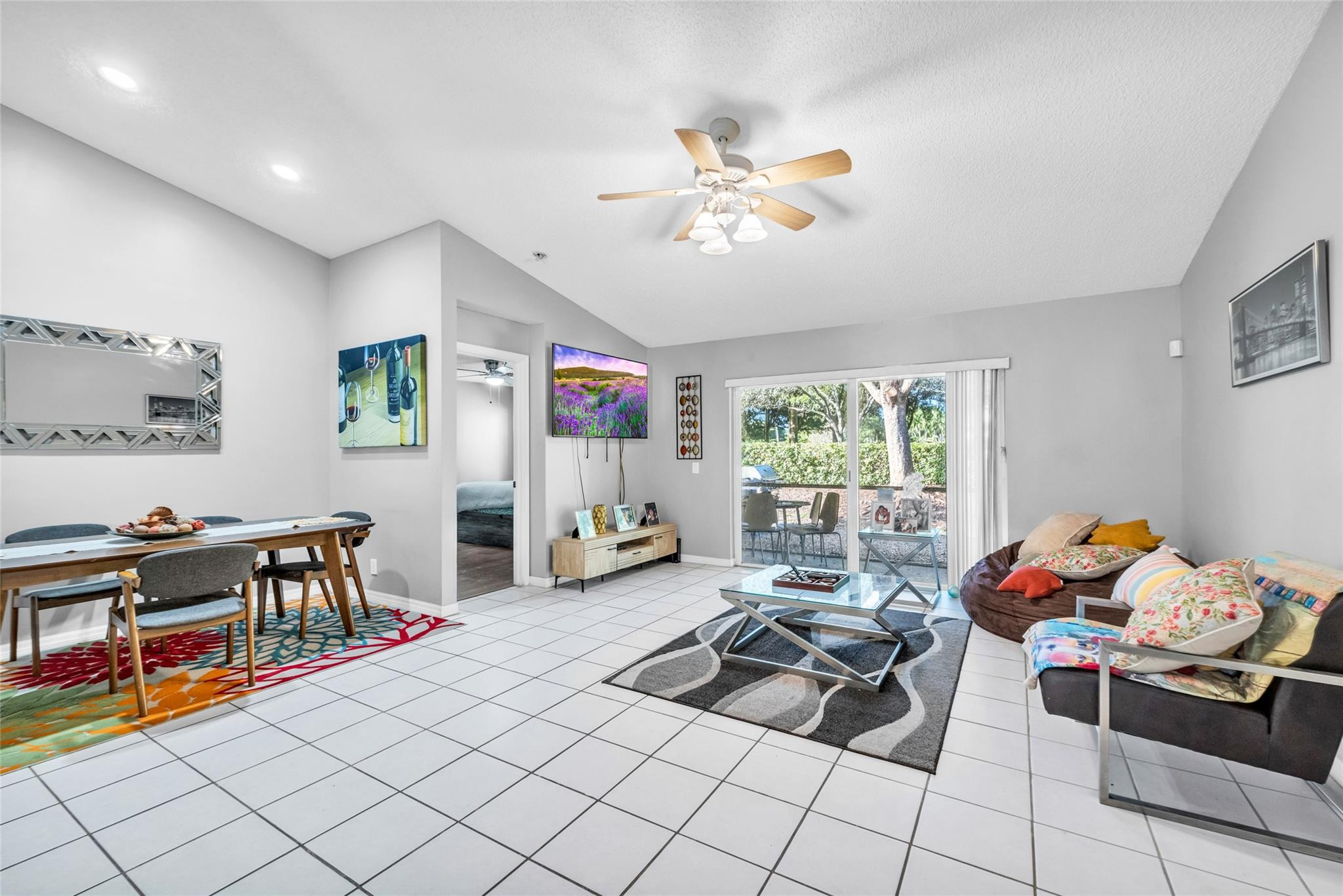 1665 Zenith Way Weston, FL 33327 - Photo 4 of 22 a living room with furniture and a window