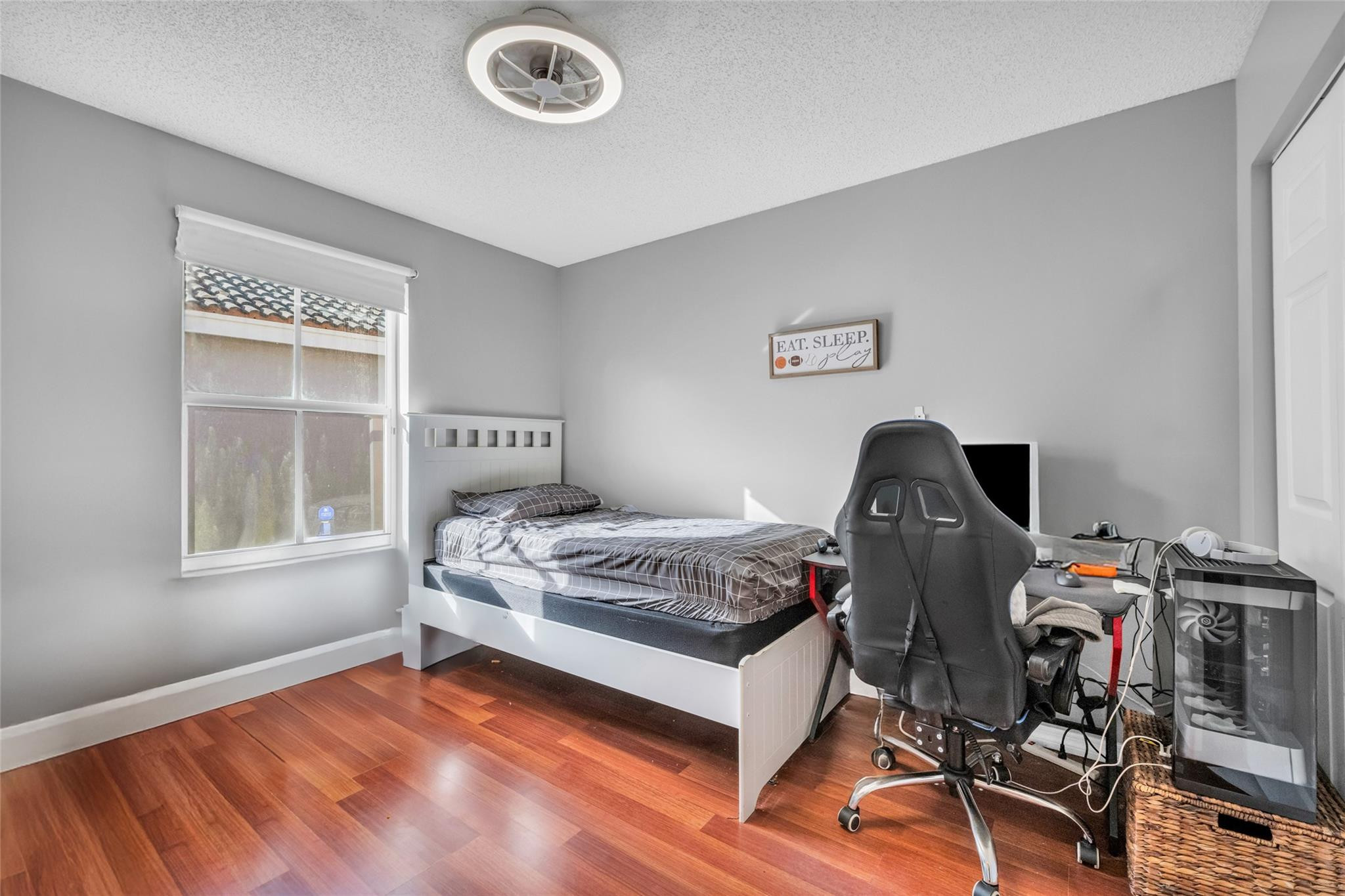 1665 Zenith Way Weston, FL 33327 - Photo 5 of 22 a bedroom with a bed and a window