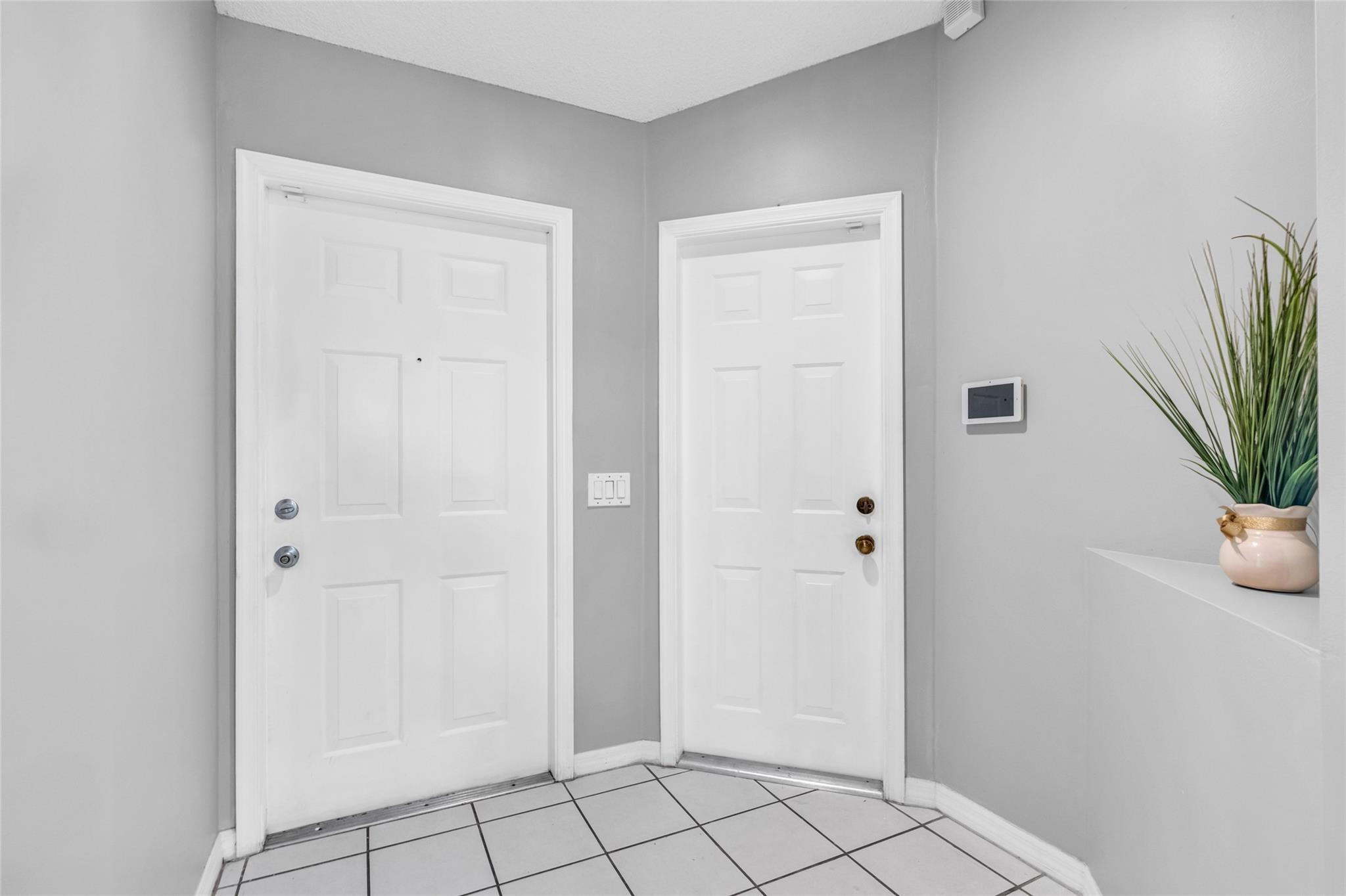 1665 Zenith Way Weston, FL 33327 - Photo 8 of 22 a view of an entryway with wooden floor