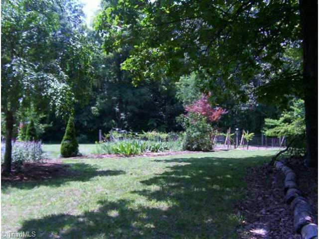 1824 Mebane Oaks Road Mebane, NC 27302 - Photo 3 of 9 Other. LOVELY BACKYARD/FLOWER GARDEN