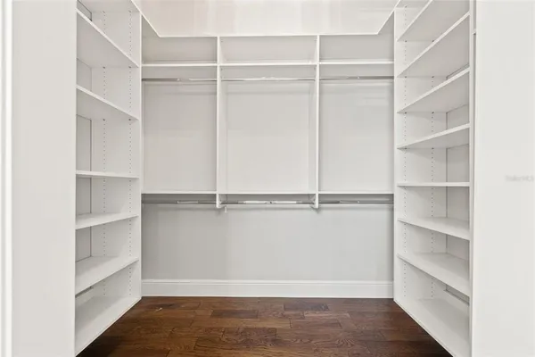 a view of an empty walk in closet