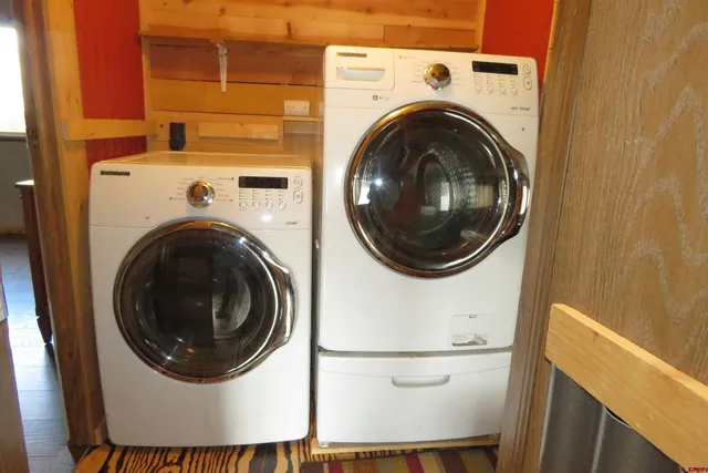 a utility room with dryer and washer
