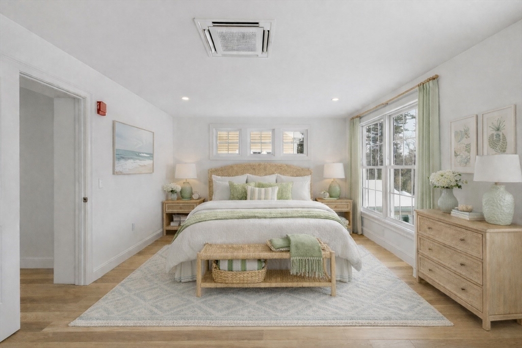 206 West Main Street, Unit 9 Georgetown, MA 01833 - Photo 13 of 25 a spacious bedroom with a bed and a window