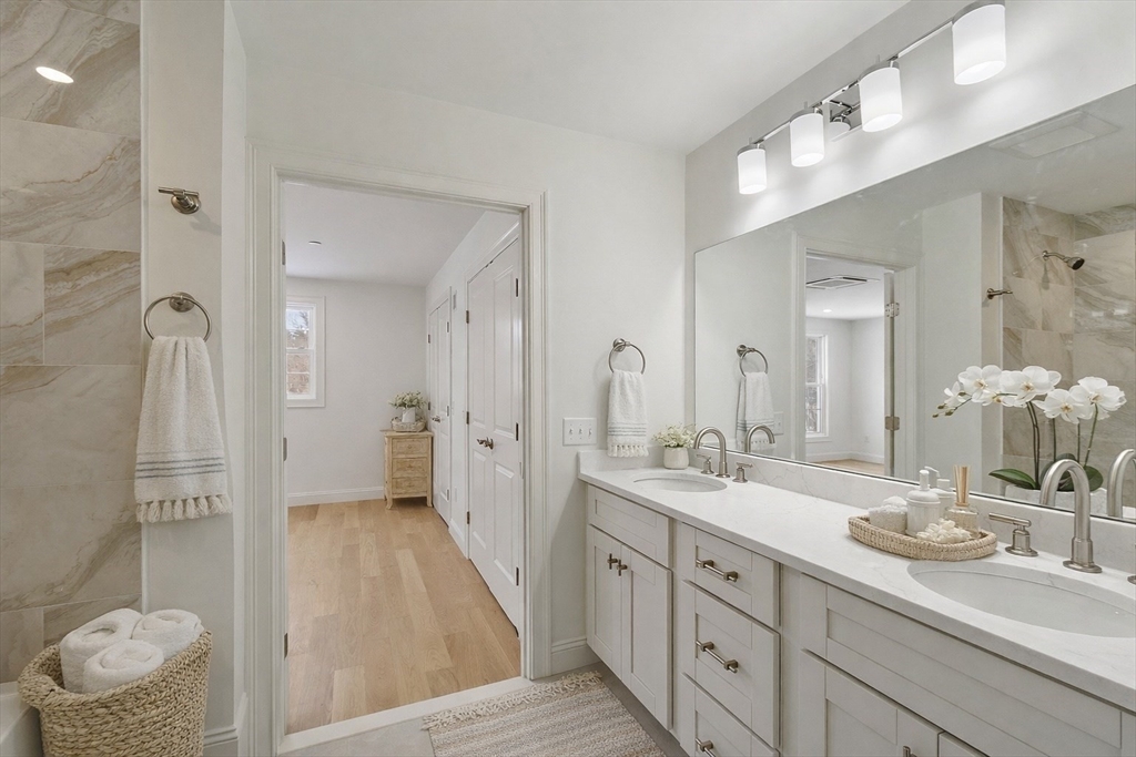 206 West Main Street, Unit 9 Georgetown, MA 01833 - Photo 14 of 25 a spacious bathroom with a double vanity sink mirror and toilet